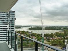  1803/63 Shoreline Drive Rhodes NSW 2138 Inspection Available 7 Days A week. Contact Tim Wu 0414 877 365 Brand New in Shores.....Level 18. Views, Views & more Views !! This massive 1 brm apartment is located in Rhodes newest building The Shores. Located on a short stroll to the water, Trains, cafes & shopping Centre. We love: * Massive living with huge enclosed Wintergarden. * Stunning kitchen with Ilve appliances...lots of benchspace & storage. * 2 further balconies, City & Harbour bridge views. * Luxurious marble bathroom. * Sweeping views from every room. * Split system A/C. * Parking & Storage. You won't find better....your inspection is invited. 