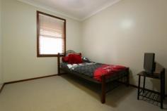  26 Maher Avenue EAST MAITLAND NSW 2323  $408,000 SITUATED in the heart of East Maitland five minutes from everything you need, including the soon-to-expand Greenhills Shopping Centre, is this ideal north-facing family home on the high side of the street. Newly carpeted and painted this home boasts four spacious bedrooms, three complete with built-in wardrobes, meaning plenty of space for the new or growing family. Both bathrooms are recently renovated and the second can be found off the laundry and features a toilet and also a shower. Floorboards have been laid throughout the high traffic areas and in the kitchen and dining area as well as the spacious lounge room helping to create a sense of space. All of this on a fully-fenced spacious block with a covered veranda to relax and unwind on. Agent declares interest.   