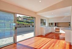  27B Stafford Street, Gerroa, NSW 2534 $820,000 This unique architecturally designed Torrens Title villa offers spacious modern living only a couple minutes' walk to Seven Mile Beach and Crooked River. Magnificent coastal views can be enjoyed from the large marble entertaining deck and open plan living room.  Brand new, this 3 bedroom villa boasts high quality fittings and finishes throughout with a modern chef's kitchen decked out with Smeg appliances and timber floorboards. There is nothing more to do, nothing more to spend, no strata fees on this seaside villa - call today and you could be living the coastal dream! 