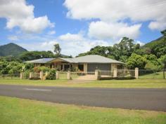  1 Harvey Rd Redlynch QLD 4870 Grand Family Acreage Home Seeing is Believing with this superbly built 5 bedroom 3.5 bathroom and 3 kitchen luxury home set on an acre of flat land with its own seasonal creek. The home itself was built to the highest standards in 2008 with no expenses spared and comprises of a massive 480m2 under roof. Beautifully detailed in a contemporary style, this home offers a wonderful sense of space perfectly suitable for the extended large family. Amongst its suite of features is the fully self-contained guest quarters privately located internally to one end of the home. Another fine aspect of the home is the chefâ€™s kitchen, exquisitely complimented with its rap around granite bench top and Island bench prep bench. There is room for a king size dining table and two separate lounge rooms. There are four bedrooms to other end of the home including the grand master bedroom and delightful en-suite. All bathrooms are magnificent in detail with granite bench tops and fine fittings. There is a separated room for linen and storage space, fabulous laundry and an extra-large lock up garage. The outdoor patio is design to entertain with its own kitchen and pizza oven. The front of the house has a long veranda and over looks distant views of the ocean. The boys also get a 7×7 two bay shed. Located in the prestigious acreage precinct of Redlynch and only a 20 min drive to the City and a short distance shopping plaza and quality schools this property will amaze you the moment you walk through the door. A classic home for a special family. Please arrange inspections through Darcy Smith on 0400 080 555 at a time of your convenience. 