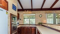  114 Amethyst Cres Mt Richon WA 6112 From $549,000 A long driveway leads to a well-established 4x2 home set on ¾ of an acre where children can ramble down to a brook. Beautifully positioned in Mount Richon, here is an opportunity to develop the land between house and brook to maximize the benefits and the value of this 3,086sqm block. A great sense of class pervades, with the formal lounge/dining with big picture windows and French doors opening onto a wide verandah. The peaceful, bush outlook can be enjoyed from both within the home and from the verandah, which serves as a wonderful outdoor area. The open-plan kitchen/dining/family with meals nook has a beautiful homely feel and is where family and friends gather to relax and enjoy a private bush outlook. At the front of the home is a spacious bedroom with huge ensuite and a walk-through robe, which adjoins the fourth bedroom - a smaller bedroom which can also be accessed from the living area. The layout has been intelligently designed so that this bedroom has easy access and could be used either as a nursery or an office. The main bathroom is positioned between the 2 other minor bedrooms, which are located at the back of the house off the central living area. Undercroft, there is security lighting, a powered brick lock-up workshop and parking high enough to accommodate a caravan, boat or 4WD.  From every area inside the home, or out on the property, you will feel surrounded by nature and connected with the sense of space and privacy of this delightful property. Convenietly located close to train station, two regional shopping centres, restaurants, cafes, library, 4 cinema complex, public and private schools and regional hospital, this comfortable and welcoming home has much to offer. Maggie Burke 0419 939 110 Features: Timber features Kalbarri stone flooring New quality carpet New curtains Mostly new blinds & roller shutters Security screens Ensuite with huge spa bath 2 vanity units Linen press Large overhead storage Fisher & Paykel dishwasher Walk-in pantry Second pantry with slide-out shelving Gas stove in excellent condition 4-gas burners in bench top Microwave hub Double sink Meals nook Broom cupboard 2 r/c aircon units and 1 cooling unit 3 gas points Security double doors on 5 exits Foxtel dish Roof TV aerial Three internal TV points Foxtel point 8 outdoor lights Taps on all 4 corners of home Natural bushland surrounds Native trees, hedge and grevilleas Partly reticulated Plenty of outdoor powerpoints  Inspection Times Wed 18 March - 6:00pm - 6:30pm 