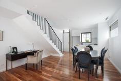  4/95 Wentworth Street, RANDWICK, NSW 2031 Drawing inspiration from the Australian landscape and seamlessly blending the raw and refined, Akora brings a fresh level of sophistication to the northern Randwick precinct and is a new landmark in this sought after address. The Townhouse @ Akora is a tribute to bespoke understated luxury, a restrained neutral palette and a feeling of space and light throughout.  This townhouse features the entire ground level dedicated to open plan living and dining flowing to landscaped courtyard gardens for ease of entertaining and a stunning caeserstone kitchen showcasing Bosch appliances. Upstairs the 2 bedrooms both with fabulous built-in robes (main with ensuite), main bathroom (with bath) and hidden internal laundry. A selection of the finest finishes include beautiful spotted gum timber flooring, porcelain floor tiles, custom joinery, ducted reverse cycle air conditioning, security intercoms and alarms. Featuring a single basement car space plus secure storage cage, a private rear lane entry via Waverley Street into the courtyard garden. 