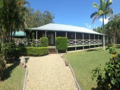  2510 Round Hill Rd Round Hill QLD 4677 It's not very often that we list such a large home on this scale. Are you looking to upsize? Alot? This former Bed and Breakfast has now come on the market for sale, 5 bedrooms all with ensuites and french doors opening onto the large timber Verandahs.  Extra large lounge room, formal dining room and seperate kitchen. The main Bedroom has an office plus parents retreat.  Of course size was no issue when this Homestead was constructed as there are wide breezy wrap around verandahs over looking the sparkling inground pool, Bbq deck and superb landscaped gardens. All this on 45 beautiful Acres. Polished cypress floors, new carpets and curtains, high ceilings and recently painted. 2 Seperate sheds 1 is a 2 bay the the second is a 3 bay constructed in colourbond. Water is supplied by 5 rainwater tanks and 2 dams. The wildlife is abundant. Call Cam today Inspections Inspections by appointment only. Features General Features Property Type: House Bedrooms: 5 Bathrooms: 5 Indoor Living Areas: 3 Built in Wardrobes Outdoor Garage Spaces: 5 Deck Outdoor Entertaining Area Shed Fully Fenced Swimming Pool - Inground Eco-friendly Water Tank Greywater System 