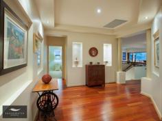  28 Silky Oak Drive Glenvale Qld 4350 Be Mezmerised..$1,250,000 ‘Santa Fe’ Stunner - passes with Distinction! ***Exclusive Viewings Scheduled this week - please call for times*** Superbly built and meticulously maintained, this custom designed ‘Santa Fe’ style residence combines gracious living areas of generous proportions with contemporary decor to create an environment that's ideally suited to grand scale entertaining or the growing family requiring extra space. An established garden setting and a quiet location within walking distance to all the best that Brookwater has to offer it’s residents, you can be confident this style is the No. 1 desired style in homes – the Five Star Dusit Thani Brookwater Resort and Spa plans follow similar architectural lines and design and your new home beautifully compliments the landscape and future of Brookwater. From the moment you enter this immaculately presented residence, you are consumed by the quality of finishes, the spaciousness and the relaxed lifestyle on offer as you overlook the 17th fairway of Queensland's No. 1 Greg Norman designed championship golf course. Architecturally designed and constructed by Peter Bell Homes, it is no wonder this home won the 'Best Home in South East Queensland' Award and featured in designer home magazines. Prior to your Viewing, here is a list of just some of the key fixtures and fittings: [] 4 Full Bedrooms plus dedicated Office, Formal Foyer Entry and Art Gallery invites you into the home via custom timber doors and through to the magnificent floor plan area [] The stunning European Gourmet kitchen is the centrepiece of this home with Italian granite benchtops, European appliances abundance of storage – it resembles only kitchens seen in Designer Home Magazines that showcase practicality and timelessness [] The Master Suite offers its own private balcony and absolutely lavish ensuite with soaring ceilings (15ft), roman spa bath, dual vanity and marble benchtops. [] Impressive open plan living area with solid timber ‘Duce’ bi fold doors open to create a seamless transition from indoors to the outdoor terrace with stunning views of the 17th fairway and green (Par 5). [] Formal lounge area includes a gorgeous period style fire place with feature Trazetti tiles, surround sound Plasma TV (42") system. [] Downstairs is a Billiard room with built in wet bar and an adjoining Media room for entertaining your family and friends [] Just through the sliding doors from the Billiard room is the covered lower alfresco terrace (duplicated outdoor area as per the upper floor) and the Mediterranean style 9m x 3m salt water swimming pool which includes a tiled water feature, spa seat, sand filter and automatic pool cleaner [] This Resort style architecture is continued throughout the home with the use of feature columns, attractive bulkheads, Jarrah timber floors and timber shutters. [] This stunning home also has a 'Santa Fe' style terracotta tile roof, Commercial grade ducted air conditioning and Vacuumaid system throughout the entire home, Security system, Intercom, insulation in all walls and ceiling and 400 litre hot water system. [] Double garage with purpose built shelving + separate golf buggy garage, plenty of internal storage including an external undercroft area which can accommodate a wine cellar, workbench and tool storage. [] Established low maintenance architecturally designed gardens with feature sandstone borders and paving (including a 3000 litre independent water supply). [] Arguably one of the BEST elevated golf course views in Brookwater Brookwater is in the heart of the new Greater Springfield CBD, the lifestyle here is like living at a resort, in fact you will be living in an exclusive suburb with the recent announcement of the $550m Five Star Dusit Thani Brookwater Resort and Spa. Take a moment to visit Brookwater Village where residents have a very modern Woolworths, speciality shops and medical rooms - you too can enjoy completing your everyday chores without leaving Brookwater! The recently opened railway line with not one but 2 train stations connect you to Brisbane city and you soon notice that everything is at your doorstep. Brookwater is close to excellent schools, University and the new Health City precinct. The $154.3m expansion at the Orion Shopping Centre Stage 2 (currently under construction) will include an Event Cinemas complex will be the largest in the region with nine-screens in total, including two Gold Class screens and two VMax screens and state-of-the-art giant digital screens and digital surround sound. Coles is also planning to open its new store in this stage and will bring in their latest large format store format and general merchandise, while Target will offer their large format store. In addition, there will be around 80 new specialty stores including additional fashion, cafes and restaurants, as well as community services and other conveniences. An additional 1200 car parks will be provided. Most important, of course, let's not forget you'll be living in the Award Winning GREG NORMAN DESIGNED Golf Community!! Please do not hesitate to call me, Irena Marasea, your Exclusive Brookwater Sales specialist today. PROPERTY FEATURES Land Size:747 Bedrooms:4 Bathrooms:3 Parking:3 