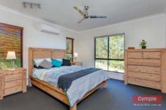  62 Outlook Rd Veteran QLD 4570 Offers Over $565,000 *Unrivalled panoramic views from every room *Modern Queenslander on 9 acres *3 Queen size bedrooms, office & media room *Master bedroom with walk in robe & ensuite *Kitchen with loads of storage & cupboards *Open plan living, timber floors & rake ceilings *Massive covered deck with panoramic views *30,000gal water capacity plus dam *Double garage underneath, sep 4-bay powered shed FOR SALE: Offers Over $565,000 With unrivalled panoramic views from every room, this modern Queenslander on 9 acres boasting a level football field sized backyard is simply stunning! This beautiful breezy home is the ultimate entertainer with its seamless indoor outdoor entertaining living and the unbelievably breathtaking views…….. and all of this located just minutes to the Gympie CBD !  Not only is this home an exceptional entertainer of generous proportions, it also boasts:  * 3 Queen size bedrooms plus separate office/4th bedroom and separate media room * Air conditioned master bedroom with walk in robe and ensuite * Light and airy kitchen features a 5 burner gas stove and double door electric oven, appliance cupboard, walk-in pantry, breakfast bar, plenty of drawers and clever storage options  * Spacious open plan living room with timber floors and rake ceilings * Open the stacker doors between the living areas and large covered deck to create an enormous entertaining area * Generous main bathroom with separate powder room and double vanity * 30,000 gallon water capacity plus dam * Powered 4-bay colourbond shed plus double garage underneath home * Designed to allow future dual living underneath if needed Prepared to be “WOWED” and come and discover this very appealing hidden gem today!  Copy & paste the following link to view property video:- http://youtu.be/iW8ehULdDSM Disclaimer All the above property information has been supplied to us by the Vendor. We do not accept responsibility to any person for its accuracy and do no more than pass this information on. Interested parties should make and rely upon their own enquiries in order to determine whether or not this information is in fact accurate. Intending purchasers should seek legal and accounting advice before entering into any contract of purchase. 