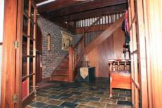  30 Laslett Cir Mundaring WA 6073 for sale  $695,000 A VERY SPECIAL HOME Tudor Homes have their roots in the pastoral Cotswold region of England and were built in the 1500's during the Tudor Dynasty. This modern excellent Tudor Style or Tudor Revival home will remind you of a cozy storybook home, set in the picturesque hills environs of rural Mundaring. A spacious entrance hall welcomes invitees into an atmosphere of hospitality, entertain in the formal living area (lounge and dining) with soaring ceilings that give a more than generous sense of space, or an informal coffee in the country style kitchen/meals and finally relax in the welcoming family room. PLUS: 4 generous bedrooms, an upstairs main bathroom and downstairs 2nd bathroom incorporated into the laundry, an activity room and study with built in furniture with a relaxing view of the majestic gum trees and plentiful birdlife. Cool evaporative ducted air-conditioning for those lazy summer days, warm gas and wood fired heating for those cold wintry nights. PLUS: Entertain family and friends outdoors in the large patio with built in speakers or meander out onto the decking and have a refreshing dip in the swimming pool and there’s more ………….  Why not view and chat with the professional and helpful Woodville Property consultants on site during Home Opens or at your selected Private Inspections? 