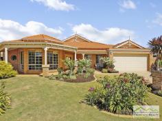  45 Seville Crest Mindarie WA 6030 For Sale $699,000 - $749,000 You can change anything in a house but you can never change the location and that is where this home screams great value. There is absolutely no need to change the size because this home is enormous. You have massive bedrooms, formal lounge/dining, separate games room, a study which could easily be the 5th bedroom and a more than spacious kitchen/meals all boasting high ceilings.  This property is located on one the loveliest streets, a very quiet and elevated spot on a good sized plot of land (680sqm) with plenty of room for a swimming pool if desired. The value of this property would rise dramatically with any sort of renovations because of the generous size and the location.  Here is a snap shot of the features:  Double Door Entry  Huge Lounge/Dining ideal to convert into a theatre and study  Five Bedrooms all more than adequate to accommodate Queen sized beds with the master being huge and framed by a bank of windows ? so pretty  Very generous ensuite and walk in robe separate WC, big bath and double sink vanity  Large open planned meals/family/kitchen  Extremely large kitchen allowing any budding chef to cook up a storm with wall oven and hot plate, stainless steel dishwasher and double fridge recess  Access from the double garage into the kitchen,  Separate Games Room or can be the theatre room  Sliding glass doors lead out to the patio from the meals area  Good sized patio with room at the back for the kids to play or install a pool in required  Split system air conditioners  Alarm System  Built approximately 1998  267 m2 (approx.) of home on a 680sqm block of land  Awesome location for quiet suburban living 