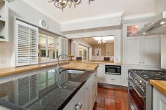  40 Eden Street, Girards Hill NSW 2480 $790,000 Built November 1954 for the Robertson family, then renovated in 2006 it includes Italian marble tiles through entrance, parquetry flooring, external sandstone cladding, new timber kitchen with silver ash and marble bench tops and an island bench with a 2 draw dishwasher. Situated on a double block giving 2 street frontages, it has an in ground concrete pool, double garage double car port and fully landscaped yard with fountain. Inside is a mixture of teak and hardwood flooring. 3 Carpeted double bedrooms, main with ensuite and all with built-ins. New Bakelite switches and tin panelling in living areas. The ceilings in the foyer and lounge room have been timber lined. Lounge room has a stone fireplace with gas installed. Agent declares interest. 