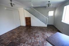  6/277 Haly Street Kingaroy Qld 4610 $178,000 PERFECT STARTER / INVESTMENT 2 1 1 This double level townhouse offers the investor or owner/occupier an easy-care comfortable living option. Situated within walking distance to the Kingaroy CBD, schools and community pool it is in excellent order/presentation. 24 hours notice required as tenants are in place. Features include:- Upstairs  -2 bedrooms with built-in robes and fans -Bathroom/toilet Downstairs -Living area -Kitchen with breakfast bar -Reverse cycle air-conditioner -Single lock-up garage -Laundry and 2nd toilet -Covered and screened alfresco area -Large backyard and rainwater tank -Close to shops, school and pool -Situated well off the street Call now for an inspection.   Inspection Times Contact agent for details Land Size 176 m2 