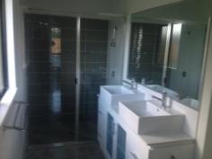  34 Ashwood Circuit Smithfield QLD 4878 For Sale $690,000 Recently Built, Brand new display home situated in the Beautiful Canopy's Edge Estate with views of Sky Rail & Mountains. This brand new modern home includes: 4 bedrooms + 2 bathrooms  Main Bedroom with Ensuite & Walk In Wadrobe  Bedrooms 2,3 & 4 all with build in wadrobes  Fully air conditioned with split systems and tiled throughout.  Media Room/Study  Large Kitchen with Gas Cooking & dishwasher.  Fully landscaped yard with room for a pool and securely fenced.  Outdoor tiled patio for entertaining  Open plan living  2 Car electric lock up garage Located only a few minutes drive to schools, James Cook University, Beaches and directly across the road from Smithfield Shopping Centre. Only 15 minutes to the City & Airport. This porperty has it all and would suit either live in buyer or investor. It is currently rented at $500 per week until June 2015 (unfurnished) View by Appointment Only  Robert Smith 0418 772 221 or 4031 1770. 