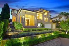 24 Bredon Avenue, West Pennant Hills, NSW 2125 Presiding over the streetscape, this elegantly grand residence provides the discerning family with the ultimate living experience, immaculately presented and featuring an exceptional array of finishes and amenity. Built just five years, it was custom crafted by renowned builder Sam Kassis and displays all the quality and craftsmanship synonymous with his brand. Expansive voids, soaring ceilings and large picture windows create a light filled haven of unique architectural appeal combined with elegant formal zones and generous open plan living areas featuring a stunning kitchen and elegant outdoor area, north facing and offering complete privacy. Complementing this five star experience, is a custom sound proofed cinema with projector and surround sound, stunning wet edged pool and spa and an impressive list of extras. 