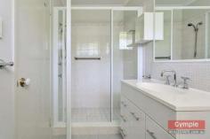  23 Running Creek Rd Kilkivan QLD 4600 $345,000.00 *4 bedroom, 2 bathroom lowset brick home *Media room or 5th bedroom, formal entry *Open plan kitchen, dining & living area *Sec screens, ceiling fans, air conditioning *Huge undercover patio & BBQ area *11m x 4m x 3.5m shed plus 6m x 3.5m shed *2 x carports, 3KW solar, 2 x 10,000L tanks *Fully fenced 1 acre, fire pit & views FOR SALE: $345,000 Nothing more to do, nothing more to spend! Just sit back, relax and enjoy yourself in a superb, quality home whilst enjoying the quaint, rural, country town charm and lifestyle that Kilkivan has to offer! * Beautifully maintained and presented, quality lowset brick veneer home  * 4 large carpeted bedrooms all with ceiling fans and built in wardrobes * Main bedroom features large built ins, air conditioning and huge modern ensuite * Separate media room, could be used as a 5th bedroom option or guest sleep-out * Formal entry leads to tiled open plan kitchen, dining and air conditioned lounge * Lounge opens onto huge, private undercover pebblecrete patio and BBQ area 	 * Large kitchen with modern, quality appliances, loads of storage and big pantry * Roomy laundry with linen storage and easy access to patio and clothesline * Security screens, blinds and ceiling fans throughout, satellite TV * Large 11m x 4m x 3.5m shed with high clearance roller door, suitable for caravan or boat * 6m x 3.5m lockable, powered shed with workbench can be used as extra garage * 2 x extra carports with shade screens, 3KW solar system * Connected to town water supply with the added bonus of 2 x 10,000L rainwater tanks * Fully fenced one acre block with lovely established trees and gardens  * Quality landscaping, fire pit, privacy and views of the mountains * 1km to town, school bus service to Gympie high schools, less than 40 mins to Gympie * Central to Gympie, Goomeri, Murgon, Bjelke-Petersen Dam and the South Burnet wine trail All of this within walking distance to Kilkivan town with cafes, shops, hotel, primary school, parks and sport facilities. This is affordable, quality living, central to everything the South Burnett and Gympie regions have to offer!  Copy & paste the following link to view property video:- http://youtu.be/P6_WcjKGOuk Disclaimer All the above property information has been supplied to us by the Vendor. We do not accept responsibility to any person for its accuracy and do no more than pass this information on. Interested parties should make and rely upon their own enquiries in order to determine whether or not this information is in fact accurate. Intending purchasers should seek legal and accounting advice before entering into any contract of purchase. 