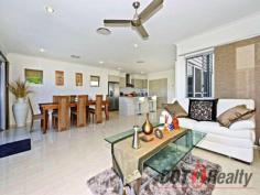  28 Quayside Drive Riverlinks Helensvale Qld 4212 $1,000,000 SPACIOUS MODERN WATERFRONT HOME This modern contemporary waterfront home with entry via a free-standing gatehouse, formal and casual living areas, plus media room, are separated by a private courtyard streaming with natural light and filtered breezes for year round comfort. The master suite with a private undercover balcony overlooks the sparkling pool and expansive views of the River Links waterways and beyond. Bathrooms include floor to ceiling tiling, contrasting wall panels and glossy cabinet finishes. The kitchen features stainless steel appliances, an island bench offering the versatility of breakfast bar seating, and an open spacious feel . The alfresco entertaining deck with BBQ, overlooks the pool and the 20 square meter pontoon for the boat enthusiast completes this waterfront package. Less than 600 meters to the Coomera River providing convenient passage to the ocean. Don’t miss this opportunity to become part of the River links community Close to the M1 prestigious school’s Medical facilities, the marina precinct to enjoy restaurants and cafes and the famous Santuary Cove. Golfing enthusiasts this is a must see. Call Michelle now on 0421608087 for inspection. 