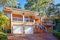 49 OLD FERRY RD ILLAWONG NSW 2234 The unique opportunity for you to truly own the dream home you have been searching for. Located in a cul-de-sac, set on an elevated pedestal which captures sweeping views is this architecturally designed, split level home that showcases clever space and innovated design. It is ideal for a young family seeking more room to move while it is both generous with space it is also filled with an abundance of natural light. 