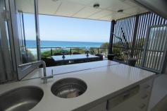 158-172 Dickson Way Point Lookout QLD 4183 $1,700,000 Top Floor - Waves Apartments Absolutely immaculate top floor apartment located at the Northern end of the Waves Apartments at Point Lookout on beautiful North Stradbroke Island. This could be your piece of paradise! This spacious 3 bedroom 2 bathroom apartment located on the 3rd floor offers luxury, comfort and the convenience of direct beach access. Fantastic North Easterly aspect overlooking the beautiful crystal clear waters of popular Cylinder and Home Beaches with views that extend across the Coral Sea to Moreton Island.  Relish your privacy or enjoy the convenience of the lagoon pool, hotel or day spa right next door. This apartment has it all with video intercom and secure entry facilities (electronic swipe tags) as well as lift access from the secure carpark. The apartment offers: * 3 spacious bedrooms * Modern bathroom, ensuite in master bedroom * Superb views and direct beach access * Spacious open plan kitchen and living area opening out to large balcony * Internal laundry * Ducted air-conditioning * Double garage * Lift access from secure basement parking The property has never been holiday rented and is in immaculate condition. View by appointment only. Call Julie today to arrange an inspection. 