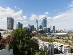  2/14 Bellevue Terrace West Perth WA 6005 FOR SALE PRICE: OFFERS FROM $3,950,000 COUNCIL RATES: $3,410 per year WATER RATES: $2,236 per year STRATA LEVY: $8,661 per quarter INSPECTION: Contact agent for details BEDROOMS: 3 BATHROOMS: 3 CAR SPACES: 3 DAZZLING VIEWS FOREVER Bellevue Terrace has been the jewel in the crown of residential real estate in Perth. The building stands on the boundary of beautiful Kings Park commanding an endless vista across the city to the Darling Ranges and the Swan River. 14 Bellevue contains 5 apartments over 6 levels and was architecturally designed to maximise the advantages of the site and provide comfortable luxurious residences that would do justice to the exclusive location. On the lower level there is the generous sized master suite with a huge walk in robe and en suite bathroom. Off the main bedroom there is a large living and dining area complete with a built in gas fire place. The living room has access to a large terrace, perfect for entertaining whilst overlooking the Swan River and City. The fabulous kitchen and family room are adjacent to the private courtyard. The upper lever consists of 2 secondary bedrooms as well as the study area and split bathroom. The apartment complex boasts a recently renovated heated indoor swimming pool, spa and sauna. There is also secure garaging on the basement level for 3 cars. With breathtaking views in a fabulous location this property is a must see.   