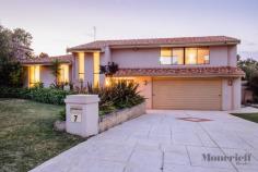 7 Campion Cres Attadale WA 6156 HOUSE FOR SALE $1,250,000 Open Home: Sat 21st Mar  12:00pm-12:45pm Your Family Dream! Keep everybody happy with the acquisition of this charming 4 bedroom plus study , 2 bathroom residence in a whisper-quiet street opposite the sprawling Wal Hughes Park bushland and close to absolutely everything else. Fantastic design sees the upstairs games/living room tower above everything else, comprising of a built-in timber bar, high ceilings, Venetian blinds, comfortable carpet and a beautiful lush outlook. The study or home office looks out to the swimming pool and can even be a formal dining room if need be, whilst a private master ensemble is separate from the remaining sleeping quarters and feature his and hers wardrobes and a shower and toilet to the ensuite bathroom. The tiled casual meals area is spacious and the family room is overlooked by a massive kitchen with delightful timber cabinetry, tiled splashbacks, a walk-in pantry, an Emilia gas cook top/oven and a Westinghouse dishwasher. Off the family zone, an intimate patio features a servery window from the kitchen, whilst a stunning separate outdoor setting includes caf blinds, two ceiling fans, a bar/sink/food preparation area and a powered storage shed all by the shimmering below-ground pool. There is also the potential to build up and enjoy future city views in a wonderful location close to schools, shopping, cafes, the picturesque Swan River itself and Attadale's lush nature reserve. Just in time for summer! Other features include, but are not limited to: Tiled family area with outdoor access to patio and pool Carpets to all bedrooms 2nd/3rd/4th bedrooms have built-in robes and desks Views of backyard lawns from 4th bedroom Fully-tiled main bathroom with a separate bath tub, shower and heat lights Laundry with broom cupboard and outdoor access Separate toilet Double linen press Remote-controlled double garage with under-stair storage and power points throughout Rear driveway access with double gates, to park a small boat or trailer High ceilings to entry Low-maintenance flooring Ample driveway parking Refrigerated reverse-cycle air-conditioning Security alarm system (with panic button) Bore reticulation Solar hot water system Insulation Foxtel connectivity Side access  784sqm block (approx.) Leafy Attadale street location close to Santa Maria College, Attadale Primary School and Mel Maria Primary School Only a 10-minute drive to Fremantle and less than 25 minutes to the city 	 