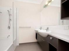  7/11 Watson Street Rosslea Qld 4812 $350,000 END UNIT - BEST IN THE COMPLEX! Large luxurious 3 bedroom + study townhouses that are fully air conditioned and fully security screened. Upstairs there are 3 bedrooms + a large study area, bathroom and good storage. The main bedroom features an ensuite and WIR. The other 2 bedrooms have built in wardrobes. Downstairs there is a modern good sized kitchen and open plan living area that opens to a patio and private courtyard. There is an extra toilet on this level plus laundry. Double lock up garage + storeroom. 