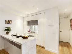  305/41 Nott Street Port Melbourne Vic 3207 Property Information Just 50 steps to the beach and the city of Melbourne at your fingertips. "Aere" apartments are the ultimate in style, class and convenience., this as-new apartment in the exclusive 'Aere' Port Melbourne building features the highest of quality finishes and the absolute best of inner city, beach side living. This spacious two bedroom apartment blends clean functional architecture with hip industrial aesthetics offering a large open plan living / dining opening to the generous private balcony with water glimpses. A chef's kitchen with marble bench tops and Miele appliances including dishwasher and gas cook top. Two good sized bedrooms with BIRs (main bedroom with balcony), central sparkling marble bathroom and euro laundry.  Other features include; Inverter split system heating and cooling, timber flooring throughout, off street parking for 1 car and storage plus access to the huge communal rooftop terrace boasting amazing bay and city views. Only metres from Bay Street cafes, bars, shops and restaurants and Melbourne's CBD. Floor Area 	 77 sqm Approx year built 	 2014 Property condition 	 New, Excellent Property Type 	 Unit, Flat, Apartment House style 	 Contemporary Unit style 	 Lowrise Garaging / carparking 	 Off street Flooring 	 Timber and Carpet Window coverings 	 Blinds Heating / Cooling 	 Split cycle a/c Electrical 	 TV points, TV aerial Property features 	 Safety switch, Smoke alarms, Intercom Chattels remaining 	 Blinds, Fixed floor coverings, Light fittings, Stove, TV aerial Kitchen 	 New, Designer, Modern, Open plan, Dishwasher and Finished in Stainless steel and Other (Marble Benchtops) Living area 	 Open plan Main bedroom 	 Double, Balcony / deck and Built-in-robe Bedroom 2 	 Double and Built-in / wardrobe Main bathroom 	 Separate shower Entrance 	 Security Video Intercom Entrance Views 	 Urban, Water, City Aspect 	 West Outdoor living 	 Entertainment area, BBQ area Grounds 	 Other (Communal Rooftop Terrace) Water supply 	 Town supply Sewerage 	 Mains Locality 	 Close to transport, Close to shops, Close to schools 