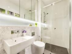  305/41 Nott Street Port Melbourne Vic 3207 Property Information Just 50 steps to the beach and the city of Melbourne at your fingertips. "Aere" apartments are the ultimate in style, class and convenience., this as-new apartment in the exclusive 'Aere' Port Melbourne building features the highest of quality finishes and the absolute best of inner city, beach side living. This spacious two bedroom apartment blends clean functional architecture with hip industrial aesthetics offering a large open plan living / dining opening to the generous private balcony with water glimpses. A chef's kitchen with marble bench tops and Miele appliances including dishwasher and gas cook top. Two good sized bedrooms with BIRs (main bedroom with balcony), central sparkling marble bathroom and euro laundry.  Other features include; Inverter split system heating and cooling, timber flooring throughout, off street parking for 1 car and storage plus access to the huge communal rooftop terrace boasting amazing bay and city views. Only metres from Bay Street cafes, bars, shops and restaurants and Melbourne's CBD. Floor Area 	 77 sqm Approx year built 	 2014 Property condition 	 New, Excellent Property Type 	 Unit, Flat, Apartment House style 	 Contemporary Unit style 	 Lowrise Garaging / carparking 	 Off street Flooring 	 Timber and Carpet Window coverings 	 Blinds Heating / Cooling 	 Split cycle a/c Electrical 	 TV points, TV aerial Property features 	 Safety switch, Smoke alarms, Intercom Chattels remaining 	 Blinds, Fixed floor coverings, Light fittings, Stove, TV aerial Kitchen 	 New, Designer, Modern, Open plan, Dishwasher and Finished in Stainless steel and Other (Marble Benchtops) Living area 	 Open plan Main bedroom 	 Double, Balcony / deck and Built-in-robe Bedroom 2 	 Double and Built-in / wardrobe Main bathroom 	 Separate shower Entrance 	 Security Video Intercom Entrance Views 	 Urban, Water, City Aspect 	 West Outdoor living 	 Entertainment area, BBQ area Grounds 	 Other (Communal Rooftop Terrace) Water supply 	 Town supply Sewerage 	 Mains Locality 	 Close to transport, Close to shops, Close to schools 