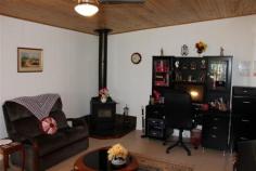  6/277 Haly Street Kingaroy Qld 4610 $178,000 PERFECT STARTER / INVESTMENT 2 1 1 This double level townhouse offers the investor or owner/occupier an easy-care comfortable living option. Situated within walking distance to the Kingaroy CBD, schools and community pool it is in excellent order/presentation. 24 hours notice required as tenants are in place. Features include:- Upstairs  -2 bedrooms with built-in robes and fans -Bathroom/toilet Downstairs -Living area -Kitchen with breakfast bar -Reverse cycle air-conditioner -Single lock-up garage -Laundry and 2nd toilet -Covered and screened alfresco area -Large backyard and rainwater tank -Close to shops, school and pool -Situated well off the street Call now for an inspection.   Inspection Times Contact agent for details Land Size 176 m2 