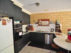  5/43 Trevally Street Tin Can Bay Qld 4580 $249,000 Property Code: 211 Property Type: Unit Features: pool, electric THE EASY LIFE Trendy two bedroom townhouse set over two levels. Downstairs comprises an open plan, tiled, dining/lounge area which opens onto a covered entertaining area overlooking the sparkling in-ground pool. The kitchen, laundry & second toilet is also on the ground level. Upstairs offers two built in, large bedrooms - both with their own balconies - the main bedroom overlooking the pool. A good sized bathroom includes a separate shower and bath. Low Body Corporate fees. Great space in this easy to care for home within walking distance to EVERYTHING. Phone Jo Now for your private inspection. About Cooloola Cove, Tin Can Bay and surrounds: The Tin Can Bay region is considered a fishing, boating and crabbing paradise located on the Cooloola Coast just off the southern tip of World Heritage listed Fraser Island. The warm, shallow waters provide safe beaches for families and calm waters for recreational boating and fishing. This is one of the few places in Australia where wild dolphins can be hand fed in their natural environment. Our area is mostly flat and caters for walking/running/cycling enthusiasts with numerous concrete pathways for safety. We offer excellent facilities including two lawn bowls venues, an eighteen hole golf course at the Country Club, a swimming pool, a superb marina with approval for a second, and two public boat ramps. The services available in this area and its surrounds include Doctors, Chemists, Ambulance, School, Library, IGA, Woolworths...just to name a few. The coloured sands and pristine waters of the world famous Rainbow Beach is a just a 20 minute drive away, Gympie is a pleasant 40 minute drive - treating your eyes to a visual feast of pine plantations and pastoral scenes set amongst rolling green hills dotted with the ubiquitous Queenslander homestead. Maryborough with its quaint, heritage-listed buildings is an easy 55 minute drive through the middle of the Tuan Forest, whilst major shopping centres abound just ninety minutes in either direction at the gorgeous Sunshine Coast or vibrant Hervey Bay. The bustling capital of Brisbane is just a 2.5 hour drive south. Come and see why this area is so popular. You could be so impressed with our region that you may never want to leave 