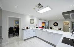  28 Weldon Way City Beach WA 6015 FR $1.75M | property type: House Quiet Way - What a Lifestyle! This fully renovated single level home is sure to appeal to the family who enjoy free flowing living between indoors and outdoors. The AMAZING alfresco area is perfect for entertaining friends with its large bbq, sink, stone bench tops and pizza oven. The alfresco connects to a MASSIVE rear level grassed area - a usable space where children can play safely. The logical floor plan offers well zoned living areas. The modern kitchen features stone bench tops, induction cook top and plenty of storage space.  Both of the bathrooms have been recently upgraded with quality tiling 