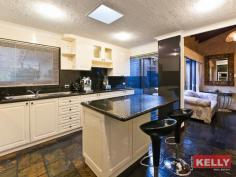  27 Matthew Ave Leeming WA 6149 For Sale   $750,000 HOME OPEN SAT 21/03 @ 1:30 - 2:00PM THE GRAND FAMILY ENTERTAINER - A MUST VIEW! Everyday is a holiday in this stunning residence!  Located at the end of a cul-del-sac, this quality Leeming home is built on a on a massive 856 m2 block designed for an active and water-loving family.  On entry, you will be greeted by soaring ceilings in the living and dining areas, overlooking an alfresco paradise that captivates you with a Hawaiian style swimming pool, a heated spa, a Balinese pergola and a secret garden decked with outdoor statues and lush gardens.  Be entertained at your very own Grand Victorian home bar in the 2nd living area as well as a modern kitchen fitted with granite stone bench top, island breakfast bar and high quality appliances. To the end of the hallway, it reveals a plush master ensuite with walk-in robe and a large luxurious bathroom with double vanity. On the other side, you will find 2 other bedrooms and the common bathroom with a spa bath. Enjoy absolute convenience as you will be just minutes away from Kwinana Freeway, Murdoch University, St. John of God Hospital, Fiona Stanley Hospital, Stockland Bull Creek Shopping Centre, Leeming Shopping Forum and all other local amenities. Features at a Glance:  * Multiple and Separate Living areas  * Master Ensuite and 2 Bedrooms  * 1 Gym/Study Room  * 1 Common Bathroom and WC * Separate Laundry Area and WC * Evaporative Ducted Air-Conditioning and Gas Hot Water System * Large Alfresco Area surrounded by timber decks and lush gardens * Outdoor Storage Room * Security Gate & Parking up to 5 cars If you are looking to indulge in the best of lifestyle living, this property is a must see. Contact Rachel Teng 0431 007 610 rachel@lauriekelly.com.au or Laurie Kelly 0418 927 898 laurie@lauriekelly.com.au today for an inspection 