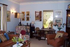  74 Walter St Balingup WA 6253 545,000 Property type: Acreage / Semi-Rural Suburb: Balingup (profile) Region: Southern Land area: 0 sqmCHARACTER AND CHARM This delightful 4 bedroom, 2 bathroom home, hidden on just over 4 acres, has warmth, character and a great feeling of homeliness. The welcoming country charm is apparent from the moment you enter through the front door, with it's beautiful leadlight insert and sidelights, to the little wooden steps leading up to the bedroom in the attic with panoramic views from the dormer windows. The home has a lovely cottage ambience, and is awaiting new custodians to enjoy it's character and charm. With many traditional features, the home has instant country appeal, yet has all the modern comforts of today. The farmhouse kitchen has terracotta style tiles, and a slow combustion stove to keep the home warm and cosy during cooler winter months. The lounge has beautiful views , ornate ceiling rose, and a welcoming brick fireplace.  Another entry in to the house is through a welcoming tiled foyer, leading into a studio with high ceilings and exposed wooden framework.  Established deciduous trees surround the house. In autumn and winter the leaves fall, allowing the light and warmth of the winter sun into the house. New leaves emerge in spring, and in summer the dappled light and canopy of the shady trees provide shelter for the cottage gardens and prolific bird life. Enjoy picking tree-ripened fruit from the assortment of fruit trees, and enjoy making pies or bottling fruit from the freshly-picked harvest.  Country living doesn't get much better than this! The property also has a large workshop/garage and has two large rain-water tanks. For more information, please call either John or Sue on 97641089 
