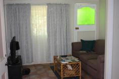  4 Holliman Street Charters Towers Qld 4820 FOR SALE $135,000 An excellent tenant is currently paying $180 per week.  - Neat kitchen  - Fresh new vinyl & tiled throughout  - 1 bedroom with walk through to smaller room. Would make excellent walk in robe  - 2 living areas (one area could be make into 2nd bedroom)  - Modern bathroom with shower, new vanity & separate toilet  - Air-con throughout  - Carport  - Garden shed & fernery  - Very neat, manageable yard  - Fully fenced     PROPERTY DETAILS Property Id: 61446180 Available: December 1, 2014 