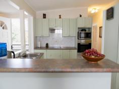  133 Nearra St Deagon QLD 4017 Large family home with self-contained flat Tucked away in a quiet, leafy street only a short walk to schools, shops and transport this well-maintained property offers space, flexibility and convenience ? perfect for a growing family. Upstairs the generous lounge is flooded with natural light and flows through to the dining area, serviced by the modern kitchen with stainless steel appliances. For easy entertaining the kitchen opens out through glass sliding doors to the covered rear deck or downstairs to the expansive covered paved area and spa. The lush landscaped gardens ensure privacy and provide a green tropical backdrop for relaxed summer barbecues. Accommodation includes three bedrooms with built-in wardrobes and a separate bathroom and toilet upstairs. The self-contained flat downstairs offers a comfortable living and a private entry. It?s an ideal space for teenagers or adult children still living at home, or for aging parents. There is ample storage and car accommodation with a double lock-up garage and carport out the back and an additional garage under the house. If you?re looking for a large, well-maintained family home that combines immediate livability with flexible accommodation and a convenient location, do not delay your personal inspection. Under Contract For Sale Offers Over $485,000 Features General Features Property Type: House Bedrooms: 3 Bathrooms: 2 Land Size: 559 m? (approx) Indoor Floorboards Built in Wardrobes Rumpus Room Air Conditioning Outdoor Secure Parking Carport Spaces: 2 Garage Spaces: 3 Deck Outdoor Entertaining Area Shed Fully Fenced Eco-friendly Solar Panels Inspections Inspections by appointment only 