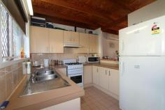  18/50 Monash Road Loganlea Qld 4131 215000 Two storey townhouse in excellent complex in Loganlea with a tenant already in place with a lease until 30 November 2015 at $275 per week. Features Include; * 2 Spacious Bedrooms with Built In Robes * Main Bedroom with Air Conditioning & Ceiling Fan * Bathroom with Shower over Bath, Vanity & Toilet * Linen Cupboard * Air Conditioned Lounge with Exposed Beams & Timber Ceilings * Kitchen with Servery to Living Area * Rangehood Plus Overhead Cupboards * Gas Cooking & Hot Water Service * Laundry with Second Toilet * Security Screens and Doors * Lock Up Garage * Front & Rear Courtyards * Low Body Corp Fees of Approx $1,355 per year * Council Rates Approx $696 Per Quarter Including Water Call now to arrange an inspection. Bedrooms 		 2 Bathrooms 		 1 Garages 		 1 Land Area 		 112 m2 