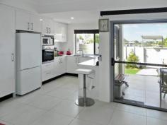  5/46 Regatta Boulevard Wurtulla Qld 4575 HUGE ROOMS GREAT VIEWS LAKE KAWANA! This near new villa has a glorious northerly aspect and a fabulous view of Lake Kawana. From the private entry to the quality options throughout, you're sure to be pleased on inspection. Extra special extras include a 2nd private parking space and 3kw Solar panel system. Situated in a secure gated complex the unit features 2 king sized bedrooms, the master with a view of the lake and the secondary with a view of the pool! Both bedrooms have large wardrobes and plenty of light and breezes. The massive bathroom even includes a large spa bath! The open plan living area is extremely private with split system air conditioning, lots of light and windows and leads out to the covered outdoor entertaining with north facing courtyard. The generous kitchen has stone bench tops, heaps of storage cupboards and a pantry, as well as a dishwasher. On the lower level there is also a large laundry, 2nd loo and more storage and direct access from the garage to the home. Downstairs is very secure with Crimsafe to doors & windows. Call me today to inspect! For Sale Vendor keen to see all offers Features General Features Property Type: Unit Bedrooms: 2 Bathrooms: 1 Indoor Toilets: 2 Study Built in Wardrobes Dishwasher Split system Air Conditioning Outdoor Secure Parking Garage Spaces: 1 Open Car Spaces: 1 Courtyard Outdoor Entertaining Area Fully Fenced Eco-friendly Water Tank Inspections Inspections by appointment only. 