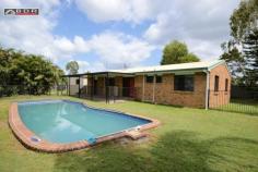  8 Robertson St Torbanlea QLD 4662 For Sale   Auction 18th April AUCTION 18TH APRIL 11.00AM Work all week - Love to entertain of a weekend - This home is just for YOU - 3 Bedrooms with built in wardrobes and ceiling fans - Open reverse cycle air conditioned lounge room with alcove for a study - Long open kitchen plenty of cupboard space with adjoining dining area - Renovated bathroom and separate toilet - Great yard with a 6ft fence all around - Maintained in ground salt water pool with security fence and gate - Security screened - Extensive size entertaining area - Double lock up garage - Insulated 