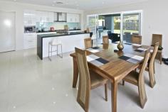  1 Conestoga Way Upper Coomera QLD 4209 $750,000 Spacious Open Plan Home Outstanding family home close proximity to schools, walking distance to the shopping center the M1 a short drive away. This Beautiful 4 bedroom family home main with en-suite, media ,study, separate family and rumpus room comes complete with pool table opening onto an outdoor area with built in barbecue for entertaining. Gourmet kitchen complimented by smeg stainless steel appliances, Black stone bench tops, electric oven and gas cook top perfection plus for the chef in the family.Fully ducted air-con,5,000 liter water tank, 5kw Solar Panels, Electric hot water,shutters throughout, vacumm maid and many more surprises await. 