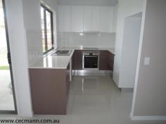  12 Omara Terrace Stanthorpe QLD 4380 For Sale   From $329,000 Each NO BODY CORPORATE TOWNHOUSES Yes you can buy your own Townhouse and not have to pay body corporate fees ever again. This is a first for Stanthorpe. There are four top of the range Townhouses in the complex and all feature huge open plan living area. Front Townhouses are single storey with three good sized bedrooms, Fully Tiled open plan living area and main bedroom with ensuite. Rear Townhouses are two storey and have a good view of lights over the town. Fully tiled living areas and one bedroom downstairs. There are so many features in these Townhouses to mention. * Reverse cycle air * Ducted Vacuum maid * Fully Caesar stone bench tops * Single Remote Garage   