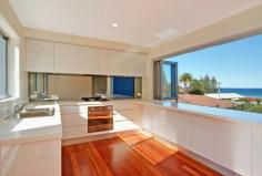  27B Stafford Street, Gerroa, NSW 2534 $820,000 This unique architecturally designed Torrens Title villa offers spacious modern living only a couple minutes' walk to Seven Mile Beach and Crooked River. Magnificent coastal views can be enjoyed from the large marble entertaining deck and open plan living room.  Brand new, this 3 bedroom villa boasts high quality fittings and finishes throughout with a modern chef's kitchen decked out with Smeg appliances and timber floorboards. There is nothing more to do, nothing more to spend, no strata fees on this seaside villa - call today and you could be living the coastal dream! 