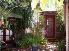  39 Warren Rd Nannup WA 6275 $450,000 Key Details property ID 322729 land size 892.00m2 Description ARTIST'S HOME, STUDIO AND REGULAR INCOME This artist’s home is full of character and features, stone walls, shaded gardens and total privacy. Use the huge art studio at the back of the block for painting, sculpture or just whiling away the hours doing your own thing. Live the lifestyle while you earn an income from the large shop out front. Zoned commercial/residential it combines a substantial shop front currently leased to a well-respected business and a private residence with studio/workshop to the rear. 