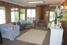  57 Caledonian Street, Kearsley NSW 2325 FOR SALE:   OFFERS OVER $299,000   Ripe for renovation is this dream opportunity to buy a three bedroom home located on an acre of land(4,000sq.m.) on the edge of town.The home features generous bedrooms,a living room that opens to a dining room and a charming bricked open fireplace that warms the entire home in winter.There’s also a large rear covered outdoor area.There is potential down the track (subject to CCC  approval) to subdivide and build your dream home next door.Close to schools,5 minutes to town,20 minutes to the Sydney freeway,10 minutes to Hunter Wine Country and it also has town water. 