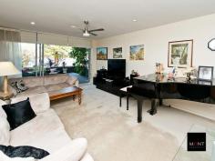  9/21 The Esplanade Mount Pleasant WA 6153 From $950K Waterfront living at its best It is rare to find such a quality apartment in one of Perth's finest waterside locations, offering size, practicality, value for money and most of all easy living. This one has it all.  Situated on the ground floor of the iconic Azure complex and right on the edge of the Canning River foreshore offering 106sqm of internal living plus 60sqm of courtyard space, this apartment provides the ultimate lock and leave lifestyle.  Accommodation comprises spacious open plan living flowing directly onto the waterfront courtyard, an impressive master bedroom suite with floor to ceiling river views from the bedroom, a walk-in robe/dressing room, and large ensuite with bath; a second good sized bedroom, elegant bathroom, stunning stone top kitchen fitted with European appliances, study nook, laundry and rear courtyard. The apartment has its own storage room and two dedicated parking spots in the secure under cover car park.  The complex itself features excellent security, expansive common lawn areas, gymnasium and vegie and herb garden.  Living in this location you can stroll out your front door and walk along the river each and every day or simply sit back and enjoy the stunning vista.  A truly wonderful way to live.   Inspection Times Contact agent for details 