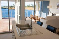  29-49 'Edgewater Residences' Varsity Parade Varsity Lakes QLD 4227 319500 Edgewater comprises lakehomes and apartments. The lakehomes are two level residences with the option of 3 or 4 bedrooms and offer excellent views over Lake Orr. The apartments are primarily 2 bedroom (2 bathroom, 2 car accommodation) designed over four low-rise buildings. The Parkside apartment building has 12 x 1 bedroom apartments. Other distinct features include: Expansive water views 	 Adjoining environmental reserve Security enclave 	 Resort facilities On Site Management Stunning contemporary architecture Quality designer finishes 	 Close to University, shops and schools Strong rental demand 	 Pet friendly Low Bodycorp Bedrooms 		 3 Bathrooms 		 2 Garages 		 1 
