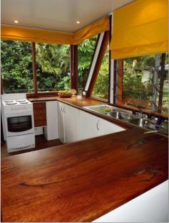 MULLUMBIMBY NSW 2482  FOR SALE:   INTEREST OVER $480,000 Set among pristine wilderness bordering the Mount Jerusalem National Park, this light-filled A-Frame cottage provides nature lovers entry to a secluded semi-rural lifestyle within easy access to all the region’s fabulous features.  The property enjoys a magnificent outlook to the rainforest valley and cliff faces of Wanganui. Across the road is pedestrian access to the national park and bush walking among waterfalls, sheer cliff walls, lush gullies and unspoiled habitats. Now is your chance to secure a rare, small allotment of 2285m2 of well -established, easy to maintain gardens and fruit tree’s. 