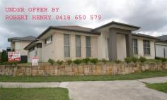 20 Maiden St, Ropes Crossing, NSW 2760 Offers above $530,000 WANT THE SAME RESULT - CALL ROBERT... This as new 3 bedroom home offers en-suite and walk-in-robe to master bedroom, built-in-robes to the 2nd and third bedrooms, huge separate formal lounge room, massive family/dining area, stylish hostess kitchen with stainless steel oven and gas cooking, the comfort of a spilt system air conditioner and lots more. Large drive through garage with remote control. Plus alfresco area off the family room. Set on a 428 sqm block approximately. Close to shops, transport and schools. Contact Robert for more information - 0418 650 579. 