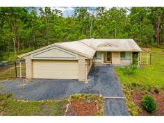  26 Glen Nathan Ct Mt Nathan QLD 4211 Price 	 $599,000 + Property Type 	 Acreage/Semi-Rural This is a fabulous opportunity to own a 3.68HA fully useable acreage property with a solid 4 bedroom home plus a 9mx6m shed. Ideal for someone with a trucking business or any other home business that needs large useable land area. Features include: 4 bedrooms all with built in robes Central kitchen with lots of cupboards & bench space Large bathroom and separate toilet Double lock up garage, Security system 9m x 6m shed, water tanks Fully fenced yard, great for dogs 3.68HA (over 9 fully useable acres) 