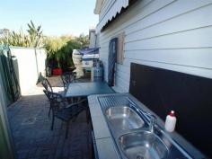  107/40 Shoalhaven Heads Road, Shoalhaven Heads NSW 2535 FOR SALE:   $84,990   This annual site is located in the beautiful Coastal Palms Holiday Park at Shoalhaven Heads. Consisting of 2 bedrooms and 1 bathroom. Open plan kitchen / lounge area. Front verandah to watch the world go by. Out the back is a great paved area for private gatherings. Concrete driveway with plenty of room to leave the boat and car hooked up. Rates: $950 per quarter (water included) Electricity is separately metered Easy drive from Sydney after work on a Friday. Great spot centrally located to all that Shoalhaven Heads has to offer. 