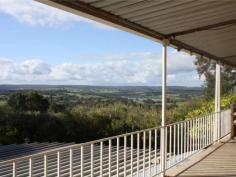  99 Hart Dr Chittering WA 6084 $570,000 ABSOLUTE BARGAIN - PRIME LOCATION CHITTERING VALLEY WITH 4X1 Located in Upper Chittering on Hart Drive this property is located in a tightly held area and enjoys spectacular views over the Chittering Valley and Lake Chittering. This beautiful property occupies 5.1 hectares (12.6acres)  A large house with 4 bedrooms and 1 bathroom with extensive verandas. A good sized dining/kitchen area with excellent storage/pantry and views from the kitchen sink. The entrance foyer opens to a large lounge room with adjoining office area. There is also a huge 12m x 8m enclosed shed with large roller door and is power connected. There is even a powered, plumbed area under the house which could be excellent storage or maybe an artists studio. The land is fenced into 5 paddocks and would be ideal for horses plus a bonus mixed fruit orchard and numerous water tanks. Located only 45 minutes to Joondalup and 5 minutes to Bindoon. Features Air conditioned 	 Balcony 	 Bathrooms 	 1 Bedrooms 	 4 Garage 	 4 Kitchen/Dining 	 Laundry 	 Lounge 	 Storeys 	 1 Study 	 Verandah 	 Workshop 	 