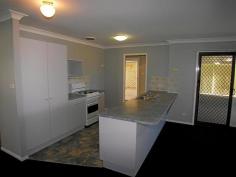  39 Booth Crescent, ORANGE, NSW  2800 FOR SALE:   $319,000   This near new brick veneer home presents in excellent as new condition from an established area in the Rosewood estate. It’s family friendly with 4 bedrooms all with built-ins plus a 3 way bathroom to accommodate the morning rush & a 2nd separate toilet. Enjoy three living areas including a separate sitting room, open plan meals area & family room plus a large fully enclosed queensland room which would be a great home theatre or games room. The kitchen includes a 2 door pantry plus a gas stove. The double garage is much larger than average, has 2 auto doors plus internal access & there is a workshop/storeroom with power in the back yard. Be comfortable with natural gas heating, two split system air conditioners plus full wall & ceiling insulation. An undercover pergola with a built-in bar-be-que is ideal for weekends of fun & relaxation. There is nothing to be done with this outstanding good value home, possibly the best in it’s price range. Just move in now & make it home sweet home or you could have it as an investment property. 