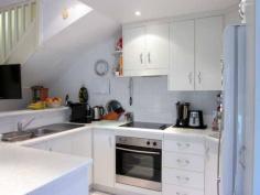  3/8 Mitchell Street Tin Can Bay Qld 4580 $335,000 Property Code: 282 Property Type: Townhouse Land Area: 223 m² Features: electric, balcony, built-in-robes, close to shopping centre, dishwasher, entertaining area, established garden Fishermans Delight Walk to the waters edge and enjoy the relaxed lifestyle that is on offer. Add to this a quality townhouse that is simply stunning in every aspect and ticks all the boxes for carefree living. High ceilings, light and airy and the open plan design of the kitchen and living areas overlook the two private landscaped paved courtyards with beautiful mature gardens and are fully fenced. The covered BBQ area offers a private and serene setting for relaxation time after a stroll along the waterfront or that BBQ with friends. All bedrooms have built-ins and the master suite has a large timber deck with bushland views. Add to this a double garage with drive through access is what makes this an outstanding home in an exclusive four unit complex. There is even room for that tinny. Close to all services and a great level walk along the foreshore. Phone Andrew now for an inspection or further information. • 2 Bedrooms Upstairs with built in robes • 1 Bedroom Downstairs with a built in robe • Lovely Kitchen with dishwasher • High ceilings & Tinted glass to windows and doors • Huge Paved Courtyard & Undercover BBQ area • Established garden & Fully fenced • Downstairs Combination Shower/WC/Shower • Upstairs Bathroom Tin Can Bay and surrounds Tin Can Bay is a fishing and boating paradise, built on a peninsula located on the Cooloola Coast just off the southern tip of World Heritage listed Fraser Island. The warm, shallow waters provide safe beaches for families and calm waters for recreational boating and fishing. This is one of the few places in Australia where wild dolphins can be hand fed in their natural environment. Enjoy a bbq, playgrounds and the walking trails along the foreshore. The town is mostly flat and caters for walking/running/cycling enthusiasts with pathways that hug the nature lovers coastline. This seaside village offers excellent facilities including two lawn bowls venues, an eighteen hole golf course at the Country Club, a swimming pool, a superb marina and two public boat ramps. The services available in this area and surrounds include Doctor/Chemist/Ambulance/School/Library/IGA/Woolworths just to name a few. Come and see why this area is so popular, you will be impressed with all that Tin Can Bay has to offer. 
