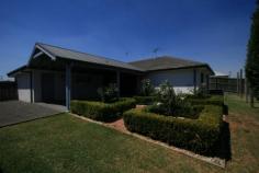 56 Poplar Level Terrace EAST BRANXTON NSW 2335 Excellent street location this brick and tile home offers generous proportions. Affording four large bedrooms, ensuite and walkin robe to main, large gallery style kitchen, separate formal lounge and rumpus rooms. There are vaulted ceilings in the living areas and ducted air conditioning for year round comfort. Stepping outside there is a double garage with internal access and a large undercover entertaining area with distant mountain views. All this situated on a large fully fenced block with side access.     $429,000 