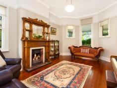  8 Park Ave Gordon NSW 2072 "WOODEND" FEDERATION BEAUTY, STROLL TO RAIL AND SHOPS Conveniently situated just 150 metres east side of Gordon station, shops, etc yet quiet, this lovingly maintained and meticulously restored character filled family home on approx 917sqm expansive land offers the perfect blend of the old and the new.  Enjoying a sunny north rear aspect, this charming Federation entertainer is on the market for the first time in 15 years and is home to only its third owners since it was built in 1906.  Showcasing soaring high ceilings, wide hallway, original fireplaces, a light-filled gourmet modern kitchen and a recently extended open plan living area flowing to private, child friendly gardens with rear lane access, this double brick home boasts a superb east side address within the prestigious Killara High and Gordon East Public school catchment and within walking distance to Ravenswood School and Pymble Ladies College. Effortlessly blending magnificent period features with modern updates, this stunning home provides a seamless flow from indoor to outdoor entertaining. * Expansive open plan living and dining with bi-fold doors and louvre windows * Elegant sitting room with original fireplace, perfect for soaking up the morning sun  * Modern kitchen with granite island benchtop and Miele gas cooktop and oven * Good-size bedrooms, master with modern ensuite, fireplace and plantation shutters * Luxurious fully tiled family bathroom; spacious home office or possible 4th bedroom * Fully enclosed rear gardens with near-level lawns perfect for young children and pets * Family living flows to alfresco deck and lush gardens with original sandstone path * Patio overlooks manicured front gardens; paved driveway for off-street parking * Original lock-up garage with rear lane access, ideal as potential granny flat * Reverse cycle air-conditioning in kitchen/living area; gas bayonets; Kauri floors * Child-friendly neighbourhood minutes walk to elite schools, preschool and rail DISCLAIMER: All information contained herein is gathered from sources that we believe reliable. We have no reason to doubt its accuracy, however we cannot guarantee it. This information is not to be used in formalising any decision nor used by a third party without the expressed written permission of LJ Hooker Gordon.   Property Snapshot  Property Type: House 